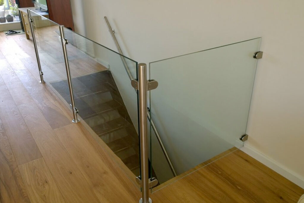 Glazen balustrade trapgat